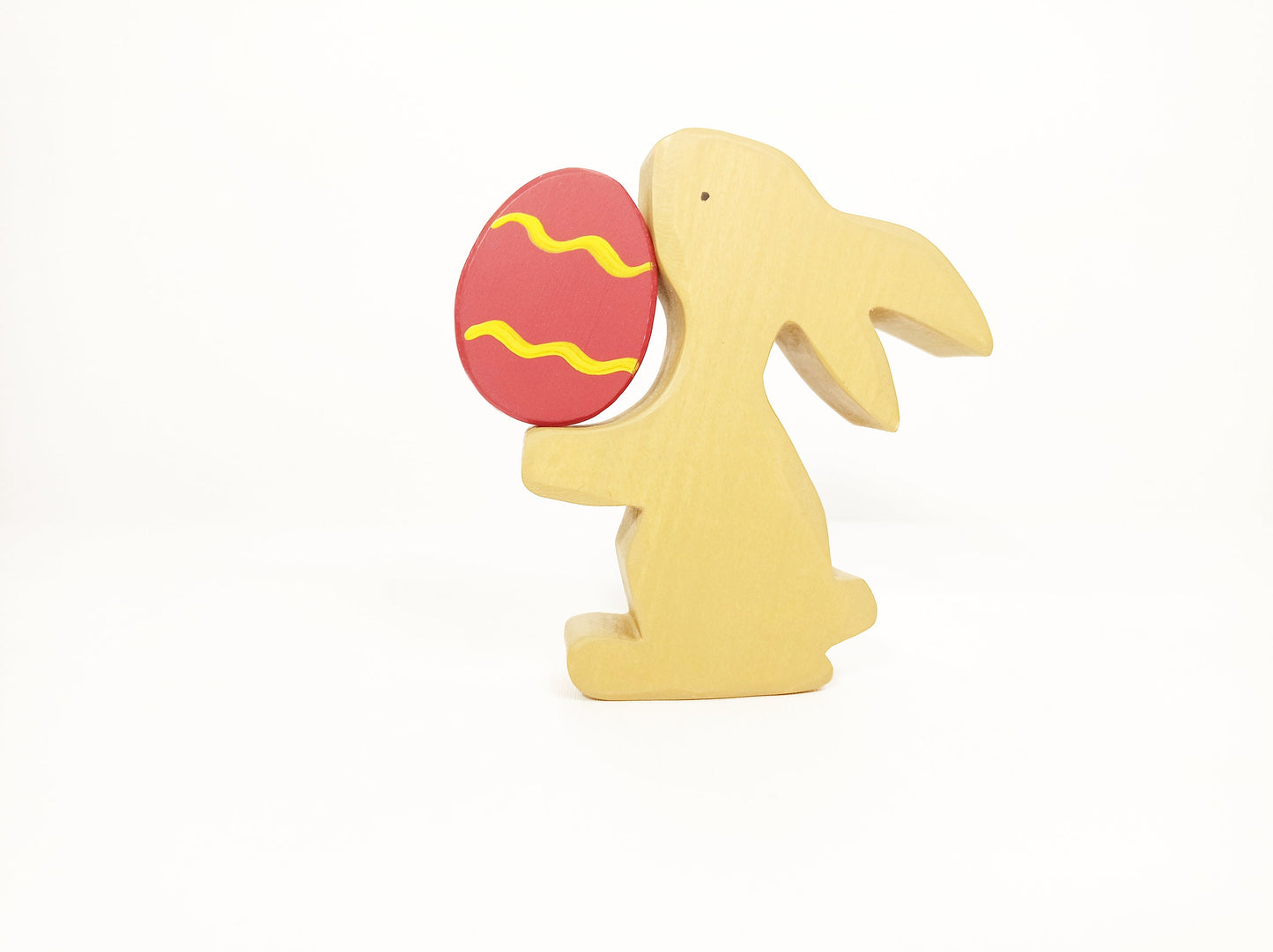 Bunny with red Easter egg wooden toy decoration