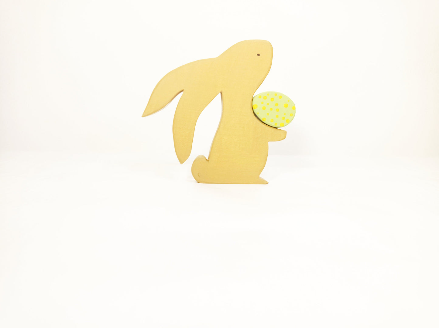 Bunny with green Easter egg wooden toy decoration