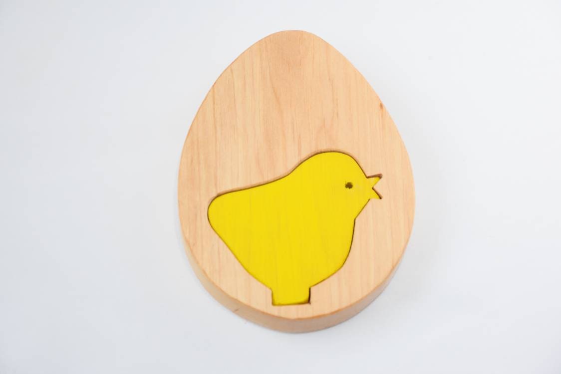Chicken in egg wooden toy